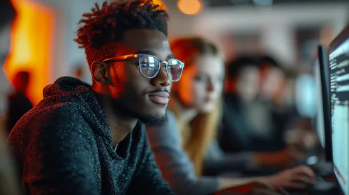 Man looking happily at screen