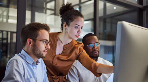 Woman pointing to screen